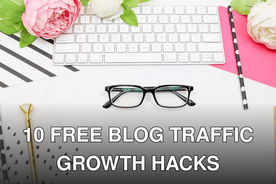 A modern feminine workspace with eyeglasses, keyboard, and flowers, creating an elegant and contemporary office vibe.