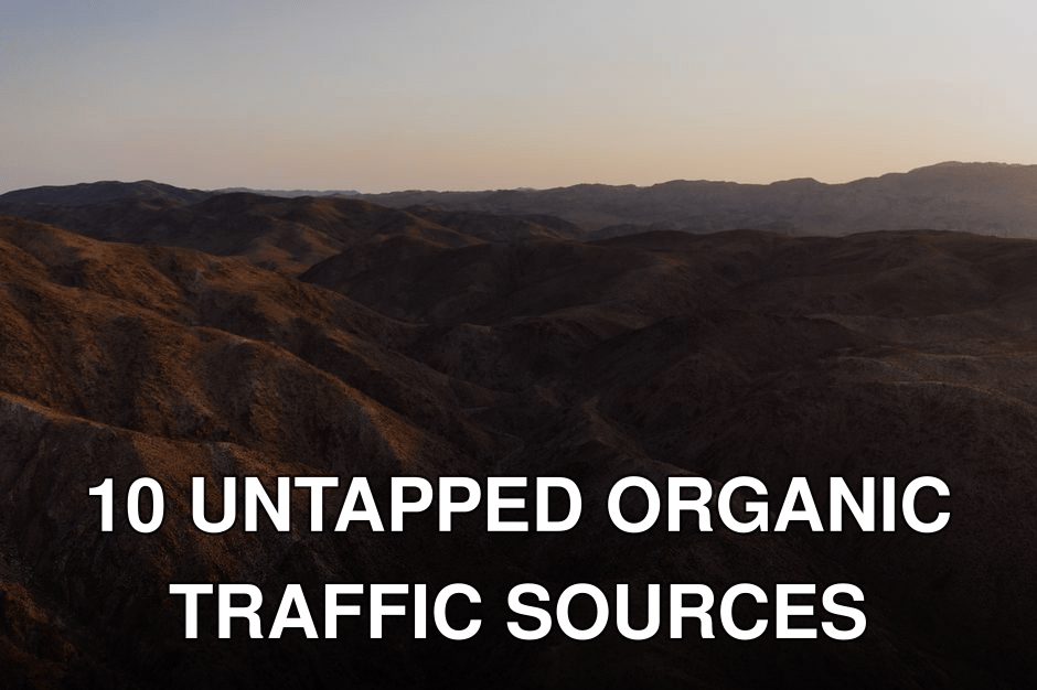 A stunning aerial view of a desert mountain range during dusk, showcasing the raw beauty of nature.