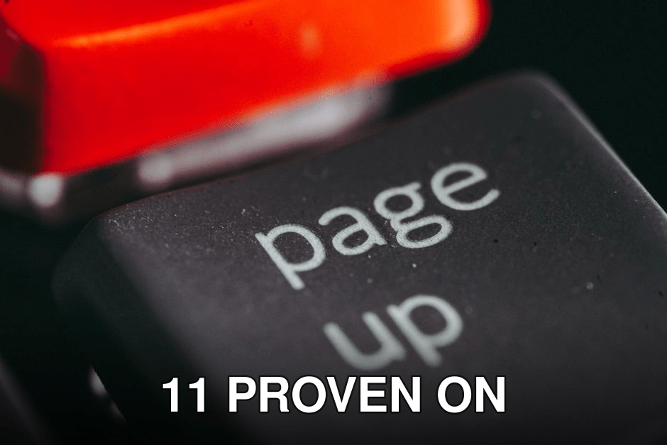 Close-up macro photography of a keyboard's 'page up' key, highlighting its texture and design.