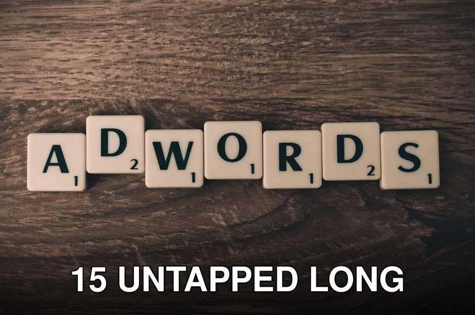 Scrabble tiles spelling 'AdWords' on a wooden surface, symbolizing digital marketing concepts.