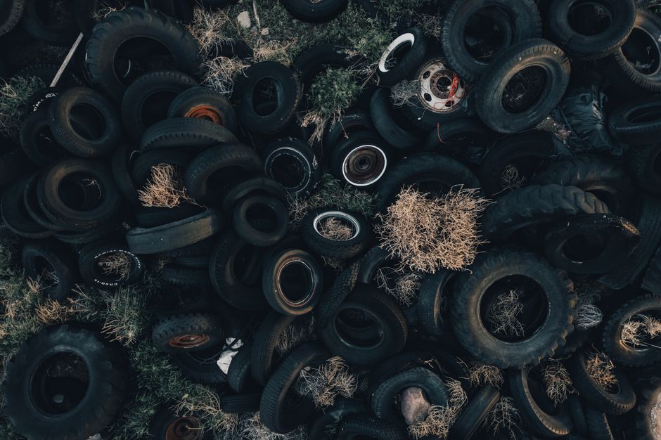 Aerial photograph of an abandoned tire dump in Monroe, Utah showcasing an environmental challenge.
