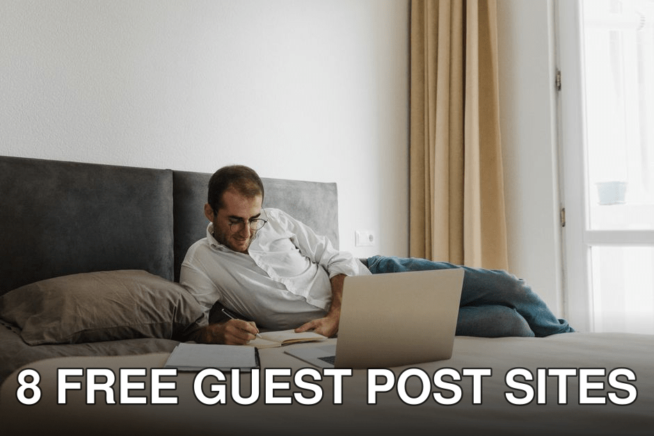 Adult man working remotely on laptop from bed, surrounded by notes and documents.