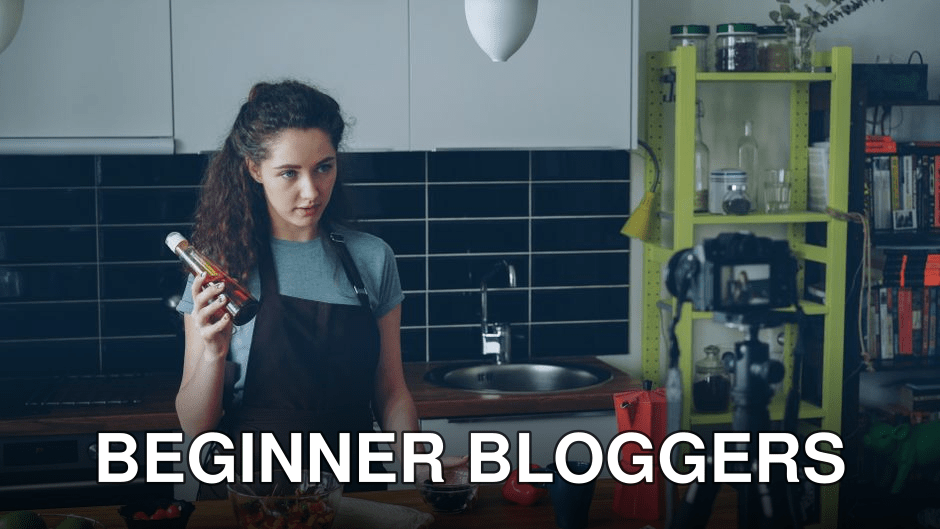 A woman filming a cooking vlog in her kitchen holding a condiment bottle.