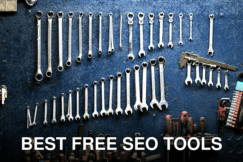 Neatly arranged wrenches and tools on a workshop wall, ideal for mechanics.