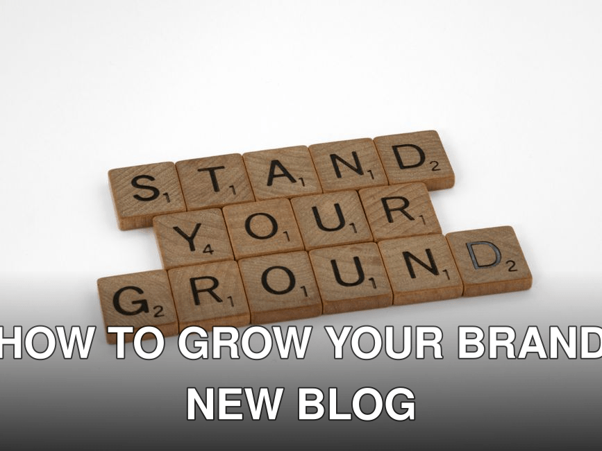 Scrabble tiles spelling "Stand Your Ground" on a white background.