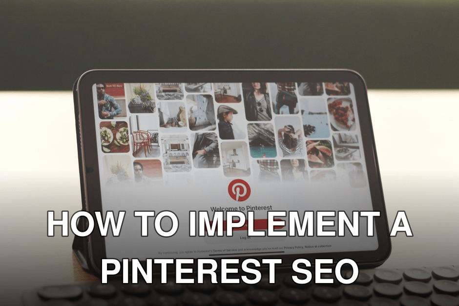 Tablet showing Pinterest homepage on a modern desk setup with a keyboard.