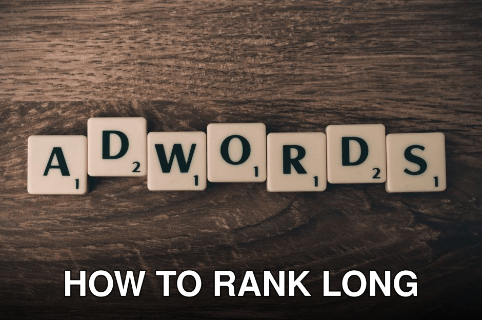 Scrabble tiles spelling 'AdWords' on a wooden surface, symbolizing digital marketing concepts.