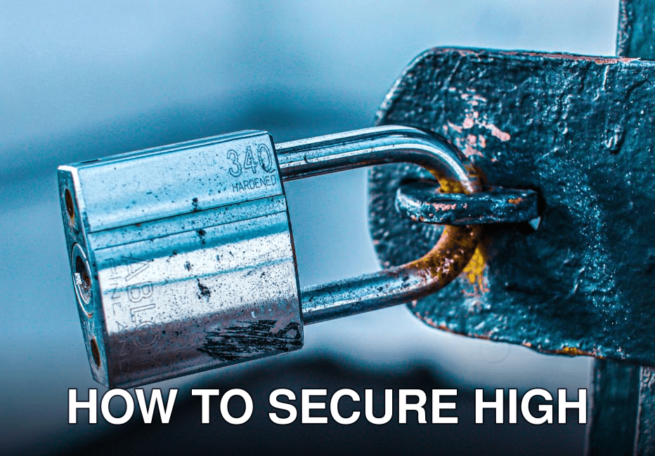 Detailed close-up of a durable padlock securing a rusted metal gate, emphasizing safety and protection.