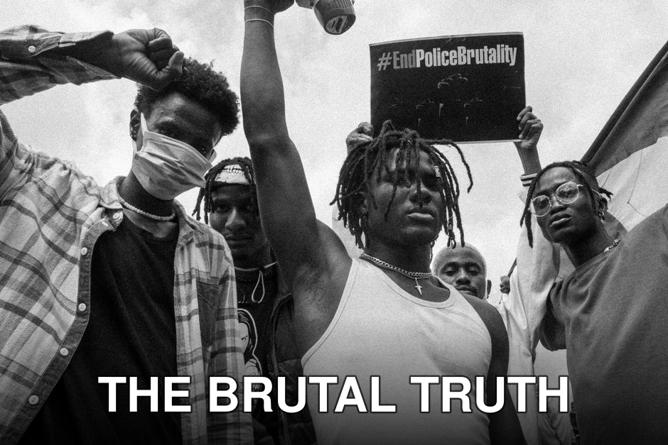 Black and white photo of activists protesting against police brutality.