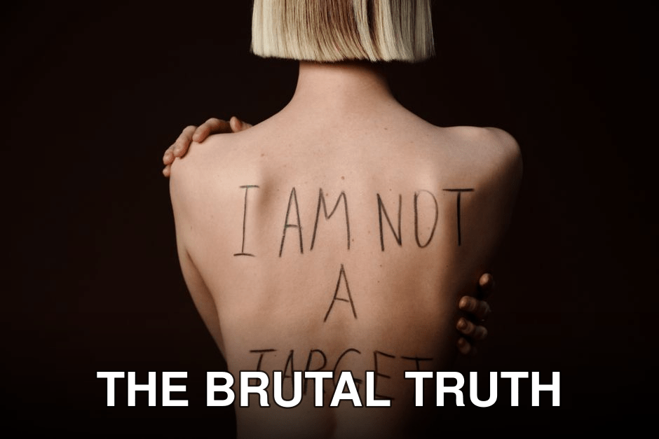 Close-up of a woman's back with the message 'I am not a target' written on it, symbolizing empowerment.