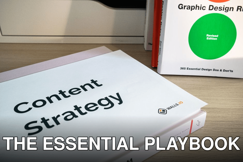 Books on content strategy and graphic design essentials resting on a wooden desk.