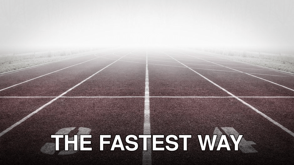 A foggy track field with visible lane numbers and white lines.