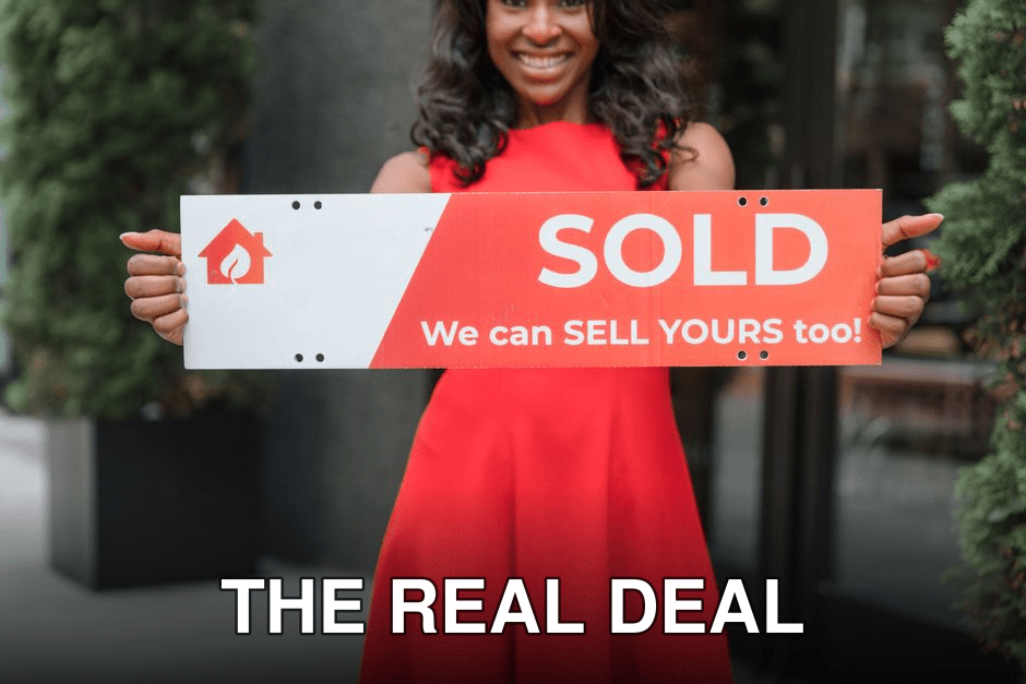 Smiling woman holding a 'Sold' sign, symbolizing successful real estate sales.