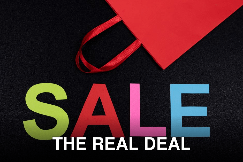 Vibrant text 'SALE' next to a red paper bag on a black background.