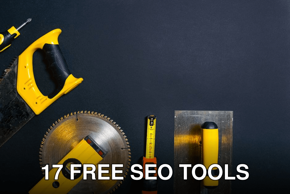 Hand tools arranged on a black surface, featuring saws, levels, and a tape measure.
