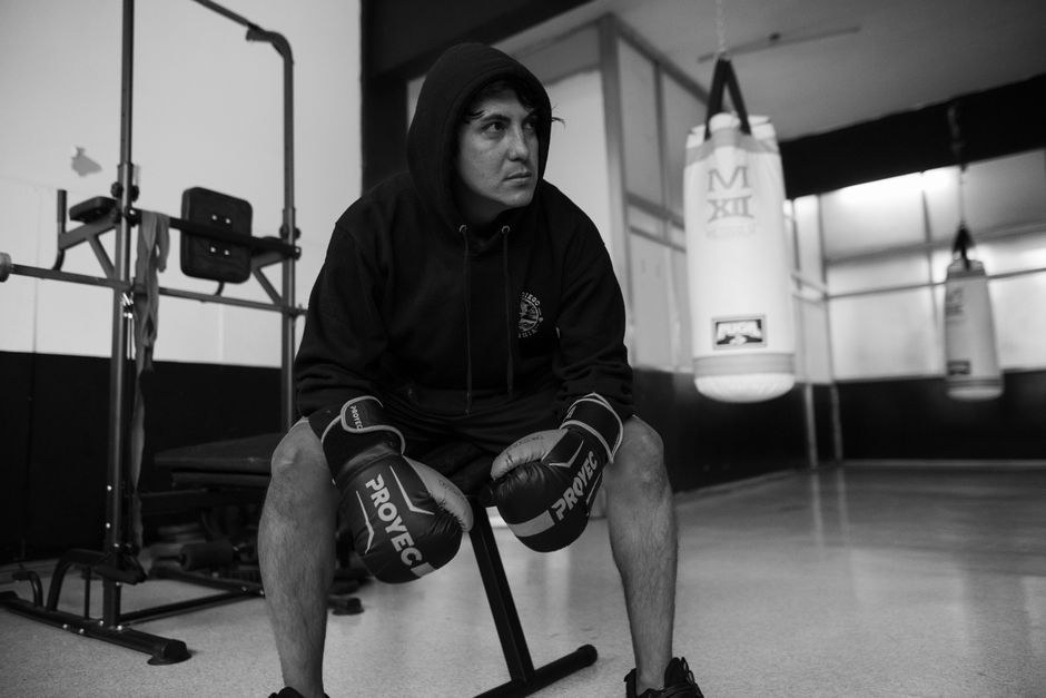 Focused boxer in training at a gym in Buenos Aires, Argentina.